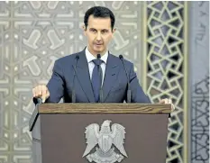  ?? THE ASSOCIATED PRESS FILES ?? Syrian President Bashar Assad appears to have survived the war, holding on to power. It looks unlikely that he will be forced from his position unless Russia drops their ally or the U. S. launches an all- out military drive against him.