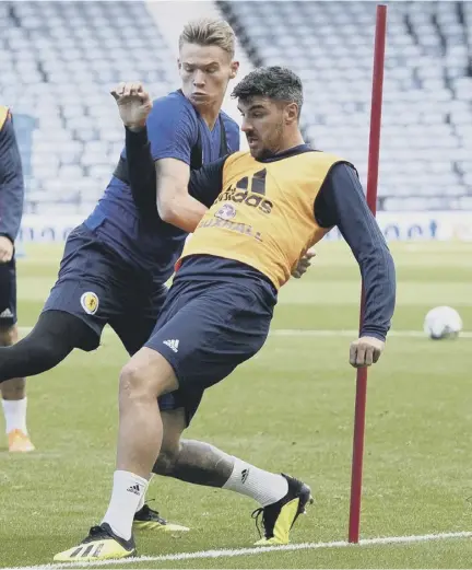  ??  ?? 2 Scott Mctominay tussles with Callum Paterson as Ryan Jack gets on the ball in Scotland’s training session at Hampden ahead of tonight’s Nations League Opener against Albania.