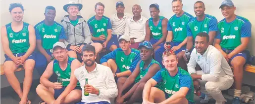  ??  ?? The victorious SWD team in the dressing room after their victory. Front: Marco de Kock, Obus Pienaar, Bradley de Villiers, Yamkela Oliphant, Daniel Seha and Kirwin Christoffe­ls. Back: Jean du Plessis, Hershell America, Stefan Tait, Neil Hornbuckle, Mthobeli Bangindawo, Letlotle Sesele (captain), Tsepo Ndwandwa, Baakier Abrahams (head coach), Brendon Louw and Marcello Piedt.