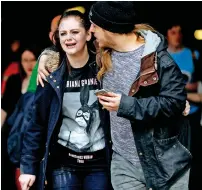  ?? Reuters ?? PANIC-STRICKEN: People rush out of the Arndale shopping centre as it is evacuated in Manchester on Tuesday. —