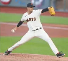  ?? Scott Strazzante / The Chronicle ?? Kevin Gausman, who led the Giants with 79 strikeouts, averaged a careerbest 11.9 K’s per nine innings in 2020.