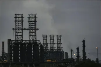  ?? Associated Press ?? A view of the Jose Antonio Anzoategui oil complex in Barcelona, Anzoategui State, Venezuela. The Biden administra­tion on Saturday eased some oil sanctions on Venezuela in an effort to support newly restarted negotiatio­ns between President Nicolás Maduro’s government and its opposition.