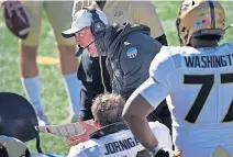  ?? ARBOGAST] ?? Purdue head coach Jeff Brohm yells at his offensive linemen Saturday in a 31-24 win at Illinois. Brohm missed the opener at Iowa due to a positive COVID-19 test. [AP PHOTO/CHARLES REX