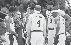  ?? CHRIS GRAYTHEN/ GETTY IMAGES ?? With no crowd noise, Lakers coach Frank Vogel said he might have to become the player whisperer.