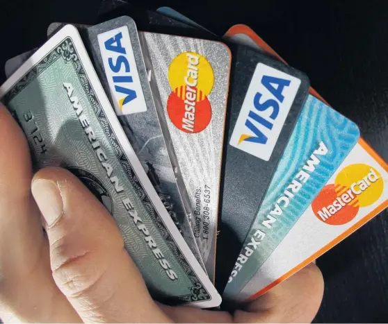  ?? Picture / AP ?? If your debt was racked up on credit cards, you’re probably paying too much interest.