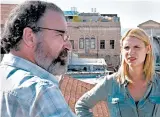  ?? RONEN AKERMAN/SHOWTIME ?? Mandy Patinkin, left, and Claire Danes will conclude their roles as Saul and Carrie during Season 8 of “Homeland.”