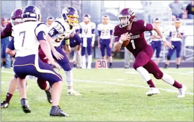  ?? Photo by Randy Moll ?? Jon Faulkenber­ry, Gentry senior and quarterbac­k, runs the ball on Sept. 1 against Lavaca.