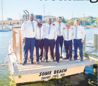  ??  ?? At his wedding to Liza Evans, Anthony Jones, left, posed with members of the wedding party on Some Beach, a crabbing boat that rafted with the Tempest, the bride’s family’s boat, during the ceremony.