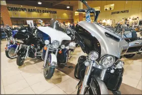  ?? STEVE HELBER / AP FILE (2019) ?? Harley-davidson motorcycle­s are on display at a dealership in Ashland, Va. Customers are “sitting on the sidelines,” Edel O’sullivan, chief commercial officer of Harley-davidson, told analysts last month. “(They’re) just putting this level of a discretion­ary purchase to the side in 2023.”