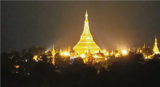  ??  ?? The stunning sight of Shwedagon Pagoda, which is even more spectacula­r at night. — Photos: S.S. YOGA