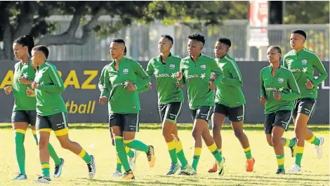  ?? Picture: FREDLIN ADRIAAN ?? READY FOR ACTION: Banyana Banyana’s players warm up ahead of a training session at NMU’s Second Avenue campus