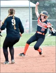  ?? PILOT PHOTO/RON HARAMIA ?? Culver’s Maegan Pearl hustles into second base during the Lady Cavaliers’ season opener Tuesday. Waiting for the throw in is Argos’ Madisyn Barcus.