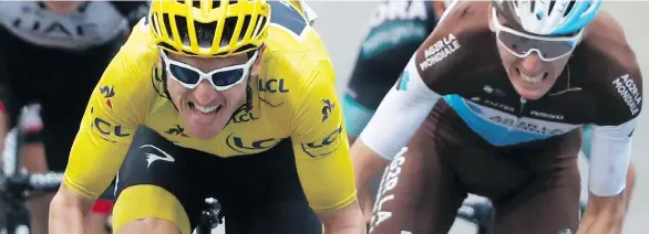 ?? PETER DEJONG/THE ASSOCIATED PRESS ?? Britain’s Geraint Thomas continues to wear the yellow jersey as overall leader with two stages remaining in his quest for a first Tour de France title.