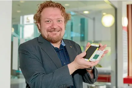  ?? PHOTO: UNIVERSITY OF WAIKATO/SUPPLIED ?? The device which Dr Andreas Mershin has developed to detect skin cancer is small enough to fit into your smart phone case.