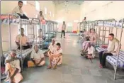  ?? AFP ?? Beggars in Hyderabad take shelter inside a temporary rehabilita­tion centre, where they were shifted after the police’s ban order.