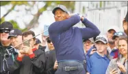  ?? Jim Damaske / Associated Press ?? Tiger Woods tees off on the 10th hole at Innisbrook’s Copperhead course during the pro-am at the Valspar Championsh­ip Wednesday in Palm Harbor, Fla.