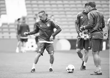  ?? — Reuters photo ?? Franck Ribery (left) during training at Santiago Bernabeu in Madrid, Spain in this April 30 file photo.