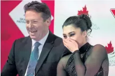  ?? JONATHAN HAYWARD/THE CANADIAN PRESS ?? Gabrielle Daleman, right, of Newmarket, Ont., reacts to her scores while sitting with her coach, Lee Barkell, after performing her short program Friday at the Canadian Figure Skating Championsh­ips in Vancouver.
