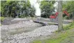  ?? FOTO: ARCHIV/UNO ?? Ein Kernstück des städtische­n Hochwasser­schutzes: die Drossel an der Schwarzach.