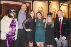  ?? NWA Democrat-Gazette/CARIN SCHOPPMEYE­R ?? Brooke Johnson (from left), Brian and Mandi Nussbaum, Brittney Daily, Heather Pribislavs­ki and Mike Daily visit at the seventh annual Moonlight Masquerade on Feb. 1.