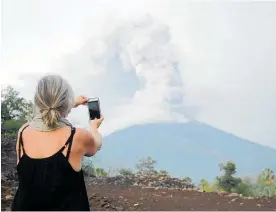 ?? Photo / Getty Images ?? Travelling without insurance can put you at risk as happened to some when Mount Agung in Bali erupted last year.