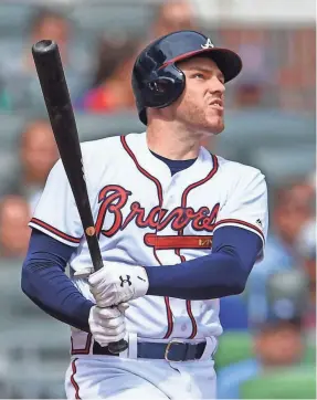  ?? DALE ZANINE/USA TODAY SPORTS ?? Braves first baseman Freddie Freeman was hitting .305 with 21 homers and 83 RBI going into Sunday.