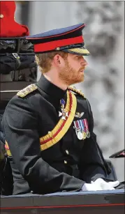  ?? CHRIS JACKSON / GETTY IMAGES ?? Prince Harry of the United Kingdom takes part last week in the annual Trooping the Colour parade in London. Harry spoke to Newsweek about his family’s quest to modernize the monarchy.