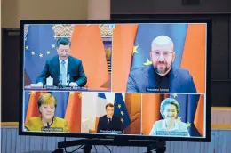  ?? JOHANNA GERON/REUTERS ?? Leaders of China, Germany, France and others are seen Wednesday during a videoconfe­rence to approve an investment pact between China and the EU.