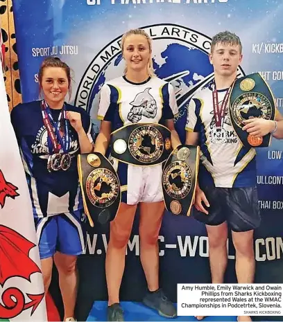  ?? SHARKS KICKBOXING ?? Amy Humble, Emily Warwick and Owain Phillips from Sharks Kickboxing represente­d Wales at the WMAC Championsh­ips in Podcetrtek, Slovenia.