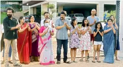  ??  ?? Chiranjeev­i and his family members clap at 5 pm at their residence in Jubilee Hills on Sunday.