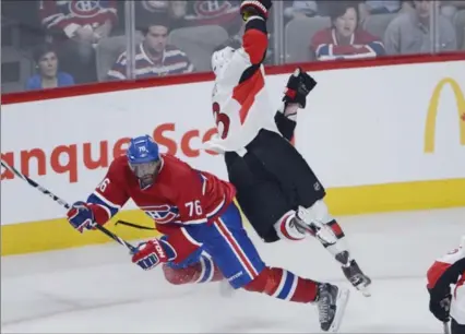  ?? RYAN REMIORZ, THE CANADIAN PRESS ?? Canadiens defenceman P.K. Subban, left, and Ottawa Senators defenceman Marc Methot collide, as Montreal won, 3-1, to even the best-of-seven series at 1.