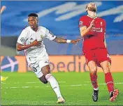  ?? AFP ?? Real Madrid's Vinicius Junior (C) celebrates after scoring against Liverpool at the Alfredo di Stefano stadium during their Champions League quarter-final first-leg on Tuesday.