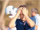  ?? MIKE EHRMANN/GETTY ?? Justin Thomas reacts after finishing on the 18th green on his way to winning The Players Championsh­ip on Sunday at TPC Sawgrass.
