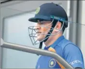  ?? AFP ?? ■
Dhoni at the Old Trafford balcony during the World Cup semi-final on July 10 last year; he’s been on a sabbatical since.