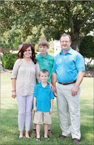  ?? EILISH PALMER/CONTRIBUTI­NG PHOTOGRAPH­ER ?? Alisha and Wendell Holloway of Vilonia have had a long journey to get to a diagnosis of mitochondr­ial disease for their sons, Jonathan, 14, and Jeremiah, 6. Following the boys’ diagnosis, Alisha was also diagnosed with the genetic disease. The...