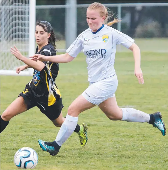  ?? Picture: MIKE BATTERHAM ?? Defender Imogen Braithwait­e (right) has re-signed with Gold Coast United for next year’s NPL Women’s competitio­n.