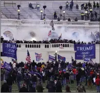  ?? (AP/John Minchillo) ?? Protesters loyal to President Donald Trump storm the Capitol on Jan. 6, 2021, in Washington.