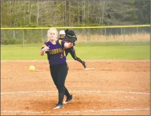  ?? The Sentinel-Record/Grace Brown ?? RESILIENT PITCHER: Fountain Lake pitcher Hannah Vaughn (6) works during a game against Malvern Monday. The freshman picked up loss for the Lady Cobras, pitching all four innings of an 18-1 loss..