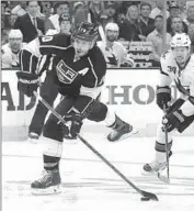  ?? Luis Sinco
Los Angeles Times ?? MIKE RICHARDS, left, seen in a 2014 game, had a key role in Kings’ two Stanley Cup championsh­ips.