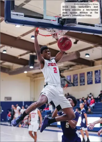  ?? Photo courtesy Darcy Brown ?? SCCS boys basketball’s Josh O’Gorra executes a two-handed dunk against Millikan at The Master’s University on Friday.