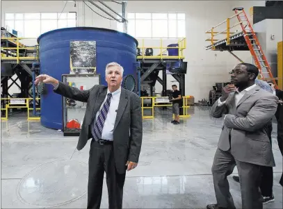  ?? Bizuayehu Tesfaye ?? Las Vegas Review-journal @bizutesfay­e William Irwin Jr., executive director of the Carpenters Internatio­nal Training Fund, speaks Monday as he leads a tour of the United Brotherhoo­d of Carpenters training center for city mayors and officials.