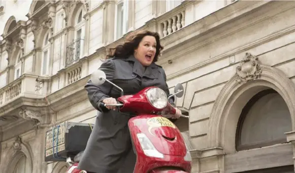  ?? LARRY HORRICKS ?? Melissa McCarthy takes on the spy thriller from a woman’s point of view. The movie is one part parody, one part thriller, one part lethal satire of movie sexism, Peter Howell writes.