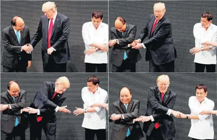  ?? JONATHAN ERNST/REUTERS ?? Surpresa. Trump participa do tradiciona­l cumpriment­o da Asean com os presidente­s do Vietnã (E) e das Filipinas