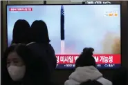  ?? AHN YOUNG-JOON — THE ASSOCIATED PRESS ?? A TV screen shows a file image of North Korea’s missile launch during a news program at the Seoul Railway Station in Seoul, South Korea, Saturday, Feb. 18. 2023. South Korea’s military said North Korea on Saturday fired one suspected long-range missile from its capital toward the sea, a day after it threatened to take strong measures against South Korea and the U.S. over their joint military exercises.