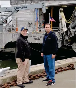  ??  ?? CAPT. DAVID GOMMO AND YUMA MAYOR DOUG NICHOLLS pose for a photo before they board the USNS Yuma.