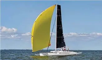  ??  ?? *Proa—a boat with a single outrigger/ama. ** Adagio—Meade's 35' trimaran, designed and built by Meade and Jan Gougeon in 1969. It is still competitiv­ely racing on the Great Lakes. Adagio sailing in the Gougeon Brother's Multihull regatta in 2019.