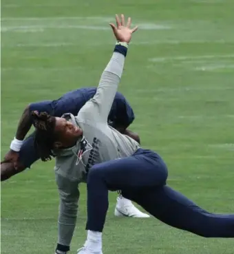  ?? CouRtesy neW engLand PatRIots ?? WELCOME TO FOXBORO: Patriots quarterbac­k Cam Newton stretches outside Gillette Stadium on Tuesday.