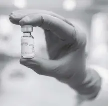  ?? JOHNSON & JOHNSON via ap ?? this July 2020 photo provided by Johnson & Johnson shows a vial of the Covid-19 vaccine in Belgium. the US is getting a third vaccine to prevent Covid-19, as the Food and Drug Administra­tion on Saturday, Feb. 27, 2021, cleared a Johnson & Johnson shot that works with just one dose instead of two.