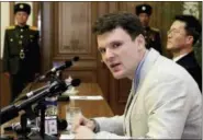  ?? THE ASSOCIATED PRESS ?? American student Otto Warmbier speaks Feb. 29, 2016, as he is presented to reporters in Pyongyang, North Korea. More than 15 months after he gave a staged confession in North Korea, he is with his Ohio family again. But whether he is even aware of that...