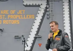  ?? U.S. NAVY VIA NEW YORK TIMES ?? Capt. Brett Crozier, then commanding officer of the USS Theodore Roosevelt, addresses his crew in November. Crozier and Rear. Adm. Stuart Baker, the ship’s two top officers, made poor decisions in response to the coronaviru­s outbreak onboard the warship, according to the final results of a Navy inquiry released Friday.